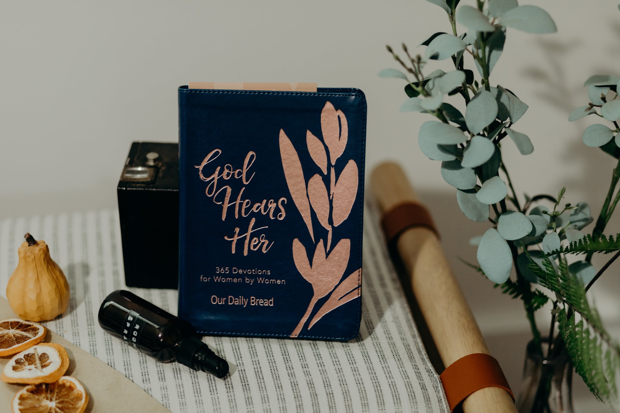 God Hears Her book with decor items